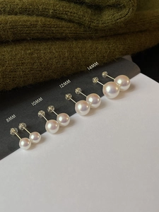 Close-up of pearl earrings in four sizes: 8mm, 10mm, 12mm, and 14mm with silver pins