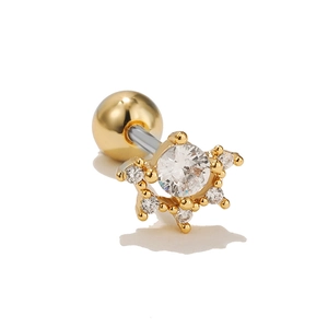 Detailed close-up of golden sunflower ear stud with shimmering cubic zirconia stones