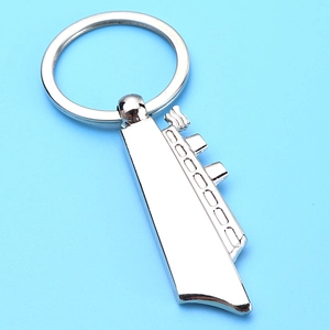 Polished silver cruise ship metal keychain with functional bottle opener and keyring