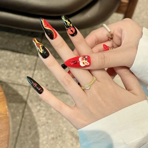 Handmade almond press-on nails with red-black 2D art and 3D cat accents