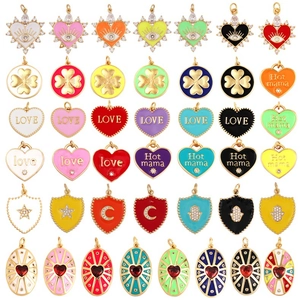 Detailed grid of colorful enamel charms with evil eye, hearts and zircon inlays
