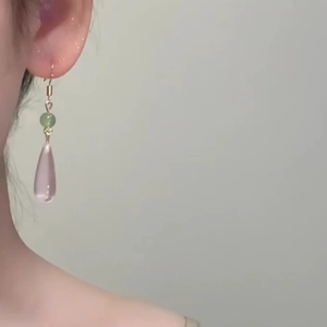 Elegant water drop resin drop earrings with gold hooks and green bead accents for women