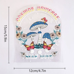 Detailed view of rainbow suncatcher sticker featuring mushroom and butterfly motifs