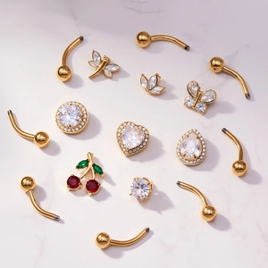 5A cubic zirconia heart and teardrop belly rings in 18k gold plated stainless steel