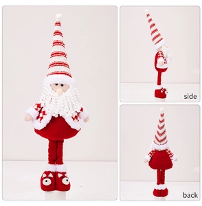 Front, side, and back views of a Christmas gnome doll with red stripes and a plush beard