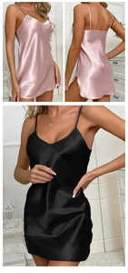 Detail of satin slip nightgown showing glossy silk texture and delicate V-neck straps