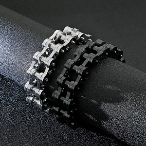 Close-up of double-row stainless steel bicycle chain bracelet in black and silver