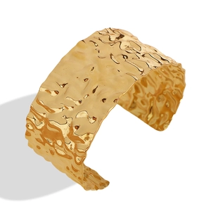Adjustable golden titanium steel open cuff bracelet with irregular hammered texture design