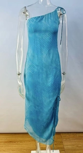 Detail of blue one-shoulder maxi dress featuring crocodile print and side slit with drawstring