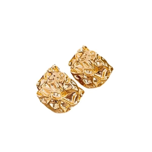 Exaggerated golden geometric flower stud earrings with irregular wrinkled metal texture