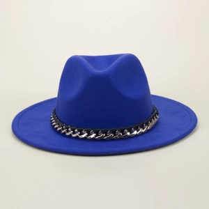 Detail of royal blue fedora hat with silver chain and black leather woven band decoration
