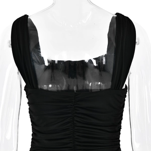 Close-up of ruched back detail and slit design on a slim-fit black summer maxi dress