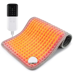Detail of gray heating pad with 10-level temperature digital controller and timer settings