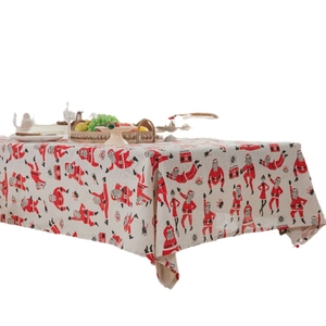 Rectangular linen-blend tablecloth featuring red Christmas Santa Claus holiday prints