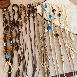 Handmade bohemian waist chain featuring acrylic resin and wooden beads for women