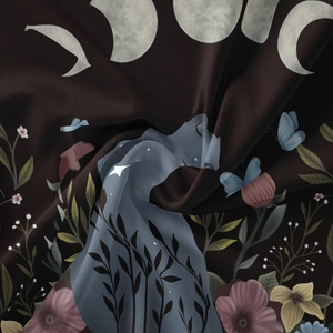 Detailed macro view of cat tapestry fabric with lunar phases, butterflies and floral motifs