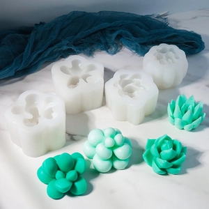 Detailed views of 4 succulent silicone molds and finished green resin wax plant models