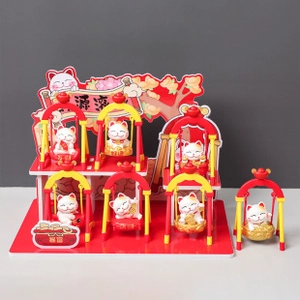 Macro shot of 7 Maneki-neko lucky cat figurines on a double-layer swing display rack