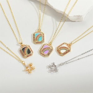 Rainbow gemstone rectangle pendants and star necklaces set on white marble stone