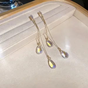 Elegant gold drop fringe earrings with colorful iridescent crystal waterdrop pendants