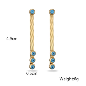Detailed dimensions of long gold bohemian earrings featuring blue evil eye beads and chain
