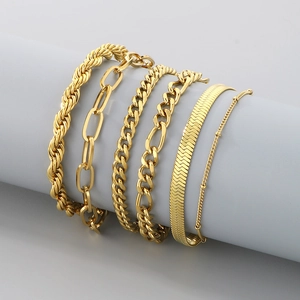 Set of six minimalist gold plated chain bracelets featuring paperclip and snake links