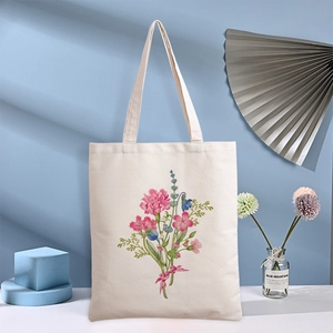 Floral print canvas tote bag in cream white with minimalist nature pattern design