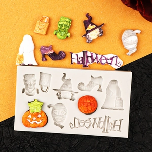 Halloween silicone mold featuring pumpkin, ghost, and mummy shapes for DIY baking crafts