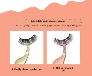 Detail view of gold and rose gold metal false eyelash tweezers with curved wide clamp