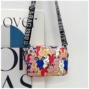 Detail of cartoon rabbit print mini crossbody bag with adjustable wide letter strap