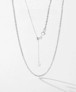 Detailed close-up of a S925 sterling silver star pendant with adjustable slider clasp