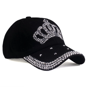 Detailed view of the sparkling silver rhinestone crown on this black cotton baseball cap