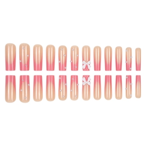 Pink French gradient press-on nails set with 3D white bows and pearl accents