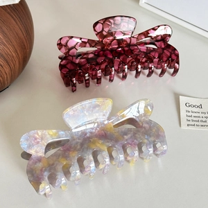 Hollow heart acetate shark hair clips in deep red honeycomb and holographic pearl finish
