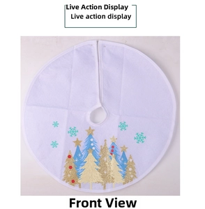 Detail showing white plush Christmas tree skirt with festive forest and star patterns
