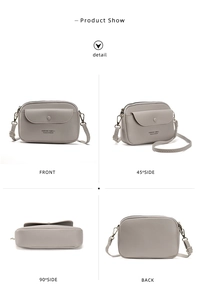 Detail view of grey litchi grain leather crossbody bag with multi-pocket design