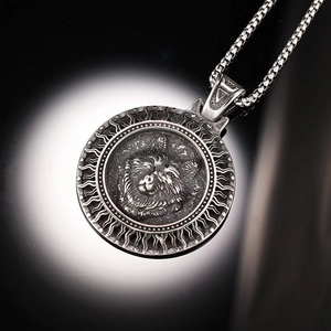 Vintage stainless steel Viking wolf head pendant with round relief on a box chain necklace