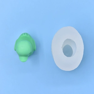 3D duck silicone mold for DIY soap, candles, and fondant on light blue background