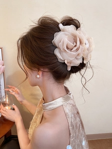 Elegant champagne rose hair claw clip made of organza and pearls for hair styling