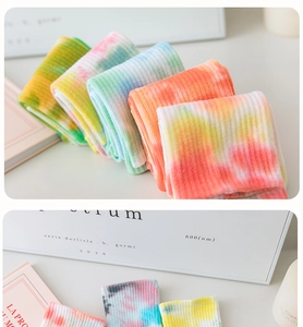 Detailed view of colorful tie-dye pilates socks with ribbed cotton knit texture