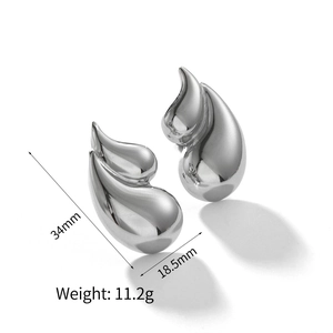 Detail showing 34mm x 18.5mm dimensions of silver teardrop stainless steel earrings