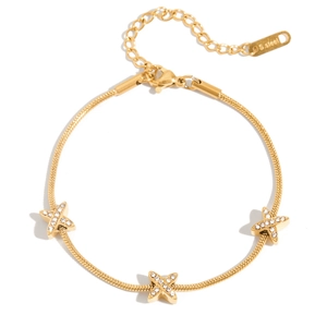 Golden stainless steel snake chain bracelet with three diamond-studded X-shaped charms
