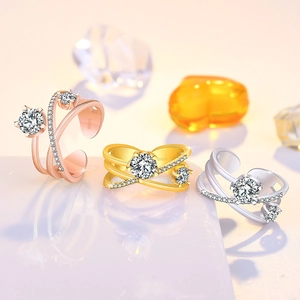 Three hollow layered S925 silver rings in rose gold, gold, and silver finishes with sparkling gems