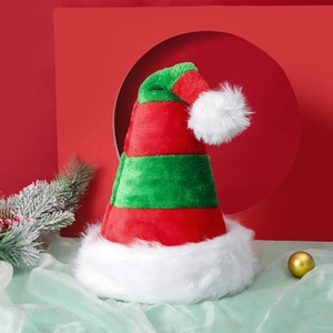 Thick plush red and green striped Christmas elf hat with white fur trim on festive backdrop