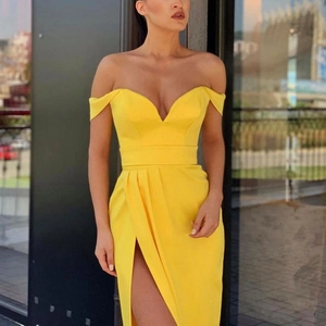 Elegant yellow off-the-shoulder evening gown with deep V-neck and high slit detail