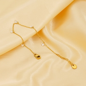 Elegant gold-plated stainless steel chain bracelet featuring five clear heart-shaped zircons