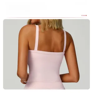 Detail of light pink yoga vest showing the backless design and dual shoulder straps
