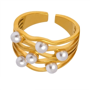 French vintage style wavy layered gold titanium steel ring with faux pearl accents
