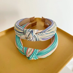 Chic knotted headband set with colorful abstract patterns on satin silk fabric