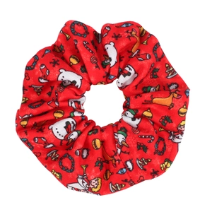 Detailed view of red Christmas scrunchie with snowmen and reindeer festive patterns